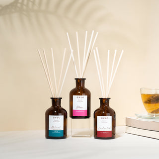 Retreat, Bloom, and Enchanted Reed Diffusers.