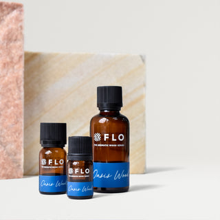 Bottles of 5ml, 10ml, and 50ml Oasis Wood Essential Oil Blend.
